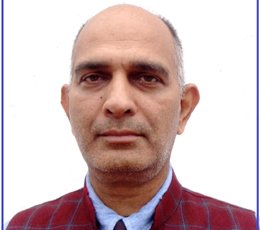 Physical education instructor with sports background and energetic pose